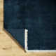 Clio Solid Color Hand Loomed Wool Area Rug in Blue