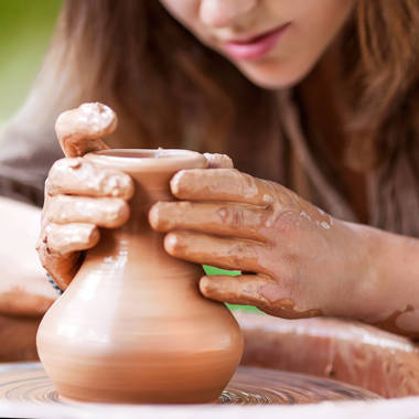 Girl Making A Clay Bowl on Sculpting Wheel Ebern Designs Size: 8 H x 12 W x 1.25 D