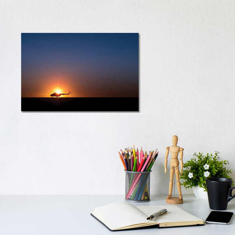 A Sikorsky S-61L Mk II Helicopter Taxis On The Runway During Sunrise by Stocktrek Images - Wrapped Canvas Print