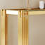 Console avec verre trempé double couche, cadre en acier inoxydable au fini miroir doré, style moderne et élégant