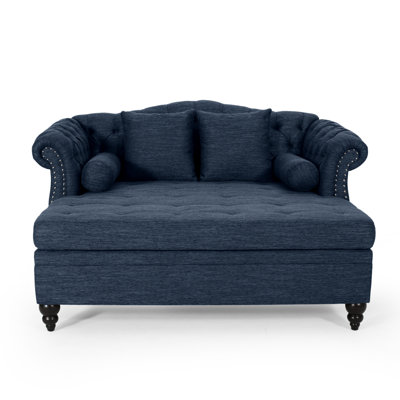 Chaise longue capitonnée avec accoudoirs roulés et garniture cloutée Lamm