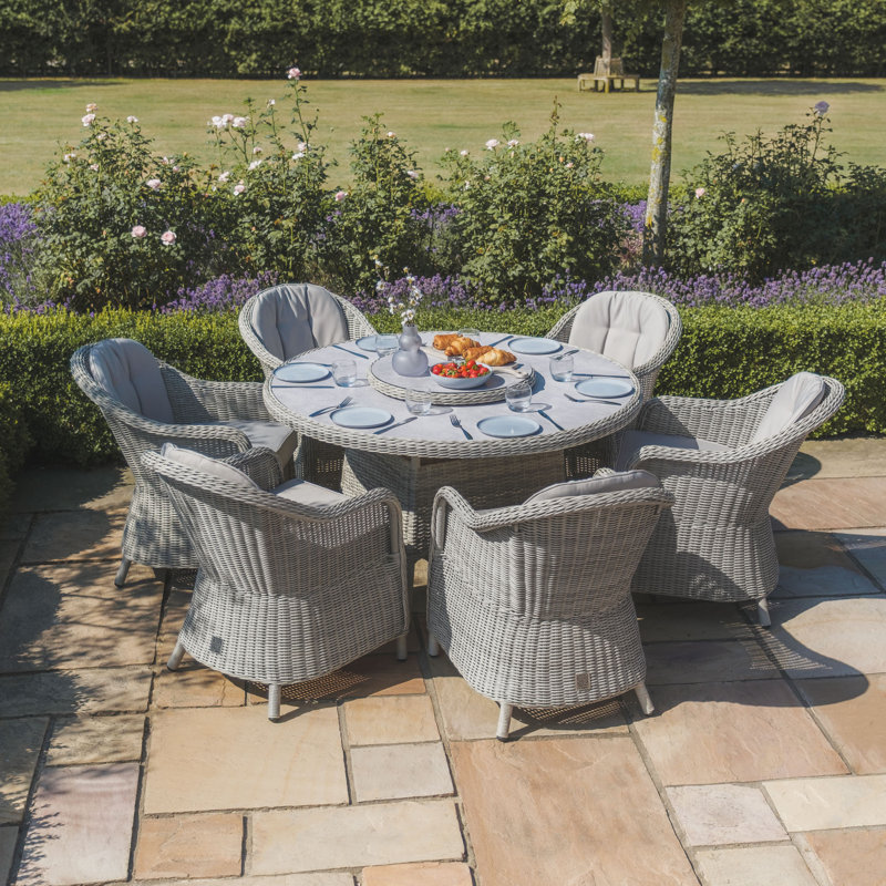 Anissah 6 - Person Patio Dining Set Umbrella Hole Included Round Table