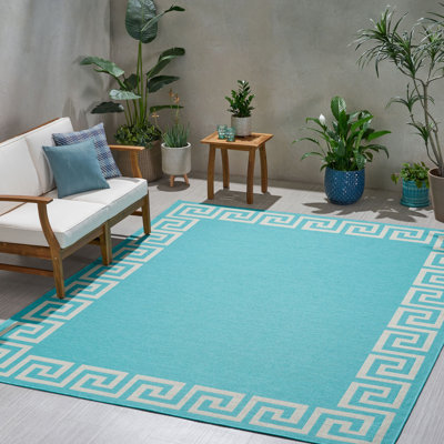 Tapis moderne en polypropylène bleu sarcelle accrocheur pour une sophistication extérieure