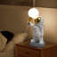 Lampe de table astronaute en résine avec lumière DEL