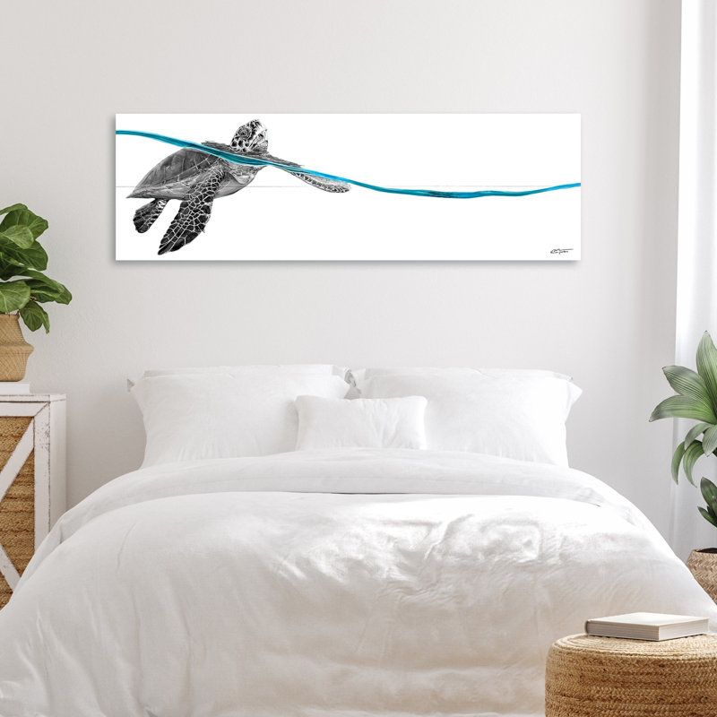 Tortue bleue sur bois