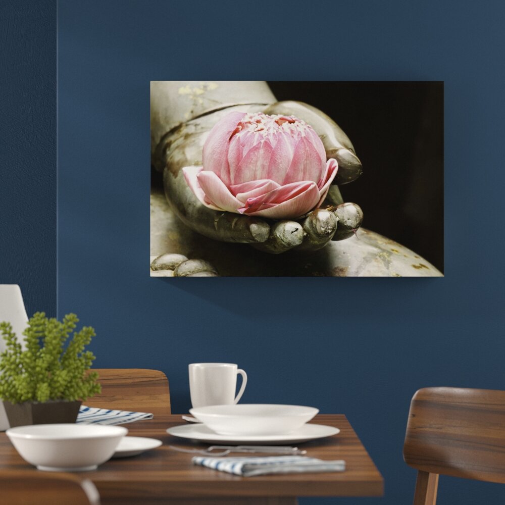 Leinwandbild „Lotus auf der Hand eines Buddhas", Fotodruck