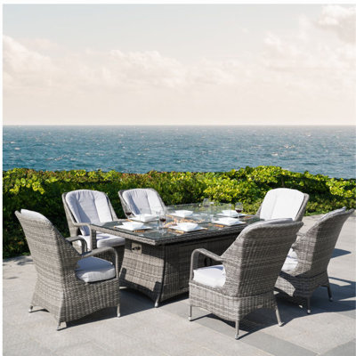 Aerolyn 5 - Person Wicker Patio Dining Set with Rectangular Table , Cushions Included