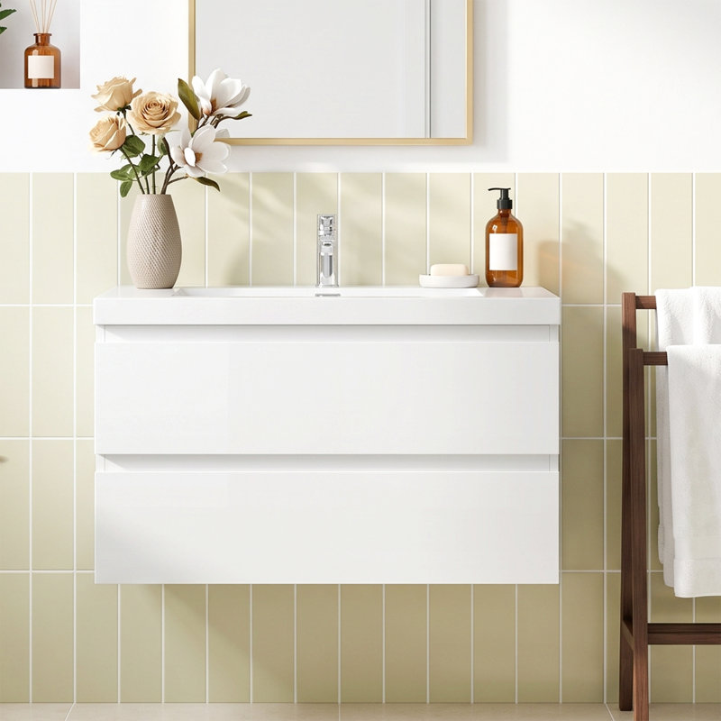 Meuble-lavabo mural de 91 cm (36 po) en panneaux de particules mélaminés blancs avec dessus en résine blanche et carbonate de calcium, deux tiroirs coulissants en forme de U à fermeture amortie, préassemblé.