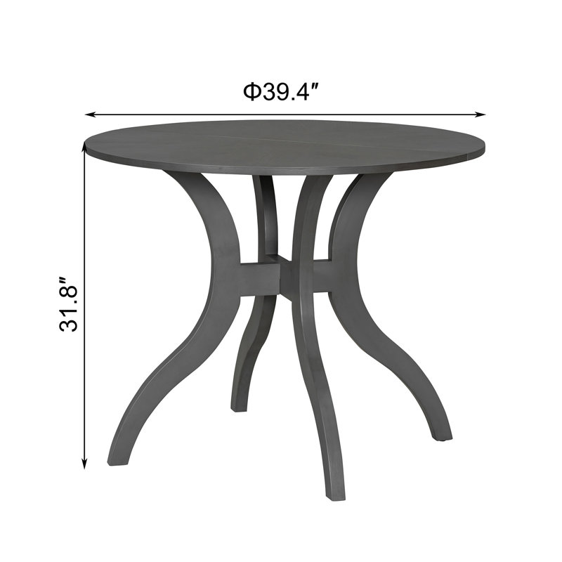 Table de salle à manger ronde en bois d'hévéa et contreplaqué, fini chêne gris, piètement incurvé à plusieurs pieds, 100 cm de diamètre, idéale pour les petits espaces.