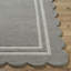 Tapis festonné-1372472653