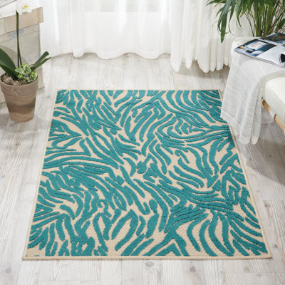 Tapis bleu à rayures Newton