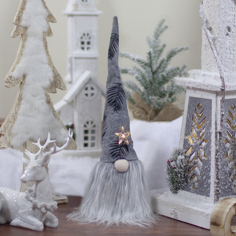 16 gnomes étoilés gris et noirs avec feuilles de palmier
