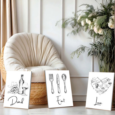 Ensemble de 3 affiches murales encadrées, « Boire, Manger, Aimer », décoration de cuisine. Ce lot de 3 croquis en noir et blanc représente une bouteille de vin, un verre, des raisins, une fourchette, un couteau, une cuillère et des ustensiles de cuisine, le tout sur un motif de cœur. Parfait pour la décoration de la salle à manger ou de la maison.