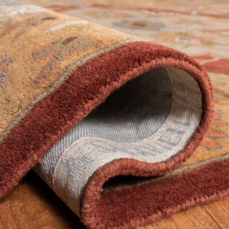 Ezell Hand Tufted Wool/Cotton/Latex Floral Rug in Rust, Round 6'
