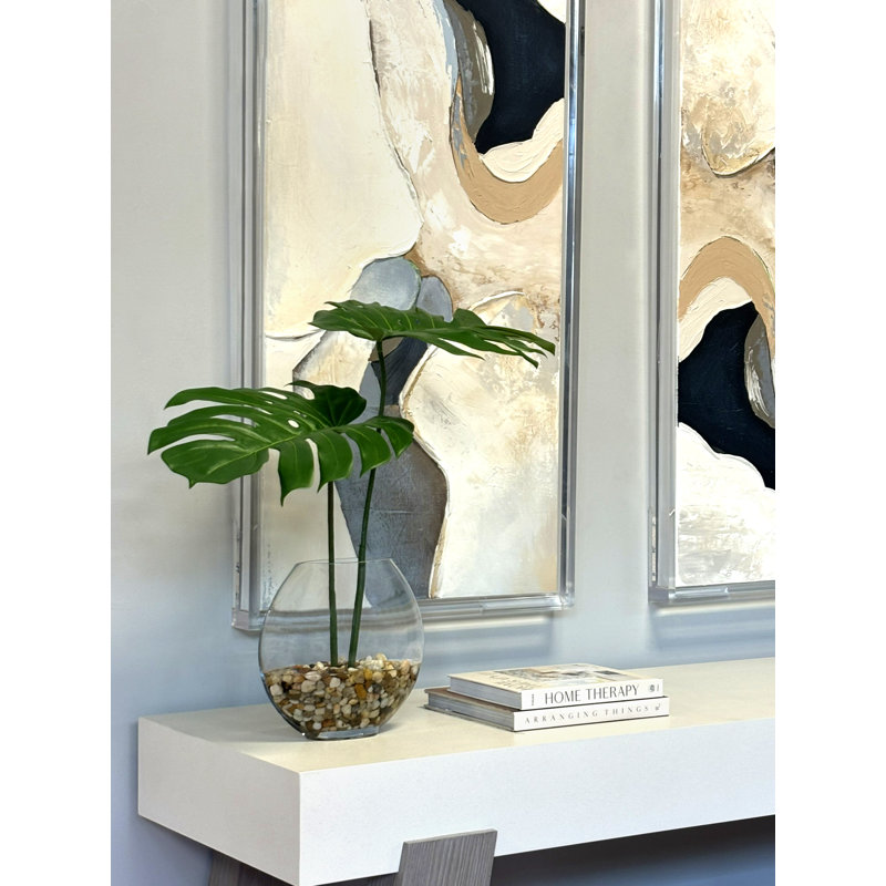 Split Philodendron Leaves In Glass Vase