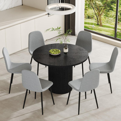 7-Piece Dining Table Set Featuring A Black Wooden Tabletop And Cylindrical Base. 42" Round Dining Table Set For 6, Combining Stability, Comfort, And Contemporary Style.