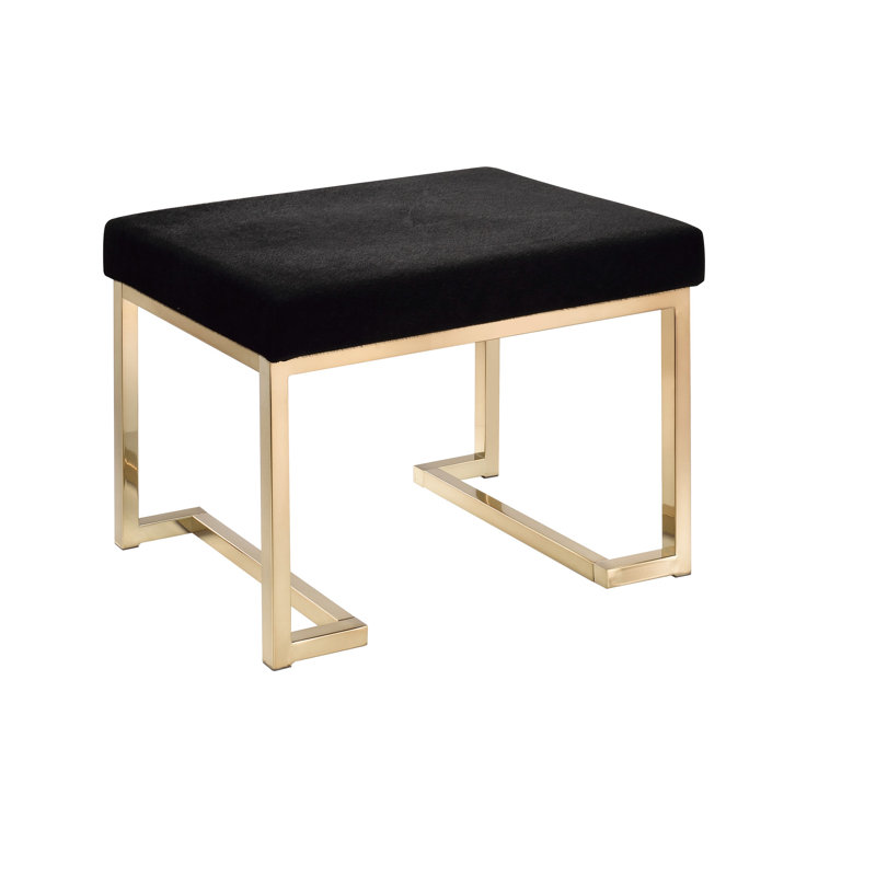 Rectangle sans dossier avec siège en tissu noir rembourré de mousse et base en métal finition champagne