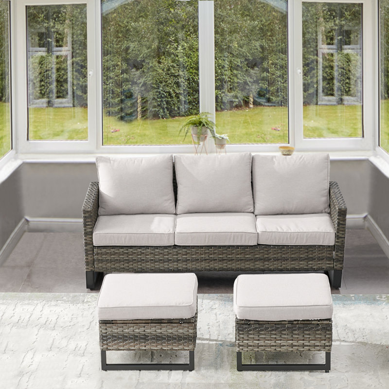 Canapé de patio extérieur en osier avec repose-pieds Ingvald, Beige