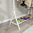 Sleek black garment rack | freestanding single-pole clothing hanger | multi-functional bedroom wardrobe organizer stand-129000481