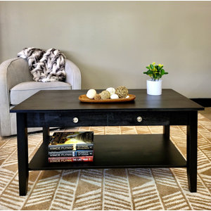 https://assets.wfcdn.com/im/39739886/resize-h300-w300%5Ecompr-r85/2185/218592680/Ambrianna+Solid+Wood+Coffee+Table.jpg