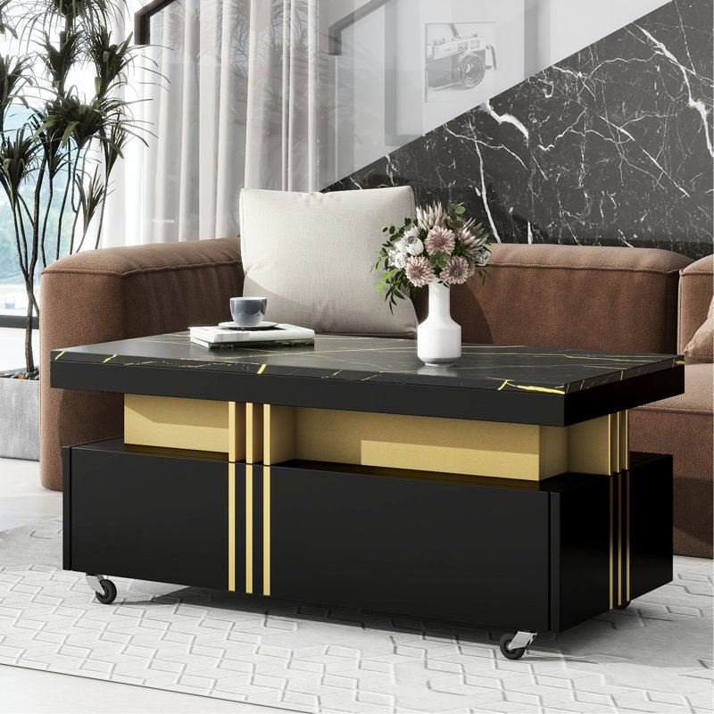 Table basse noire avec tiroirs pratiques et roulettes