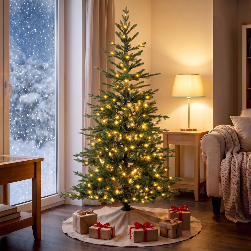 Sapin de Noël vert clair préilluminé de 1,80 m avec des branches inclinées vers le bas.