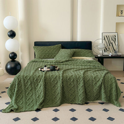 Jeté en polaire jacquard toutes saisons pour lit et canapé.