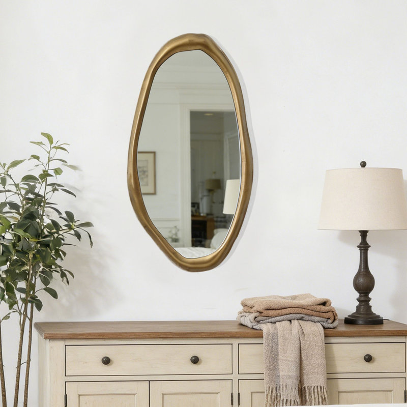 Elegant Wall Mirror with Curved Frame, Aged Gold Finish, Modern Accent Decor, 29.5"x15.25"