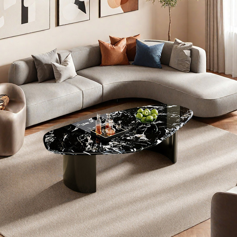 Irregularly shaped marble coffee table, 15.7" H x 43.3" L x 23.6" W