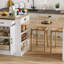 Console d'îlot extensible avec tiroirs, armoire à deux portes et tablettes ouvertes. Sert de table de salle à manger, de bar pour le petit-déjeuner temporaire et de salon de thé l'après-midi, blanc