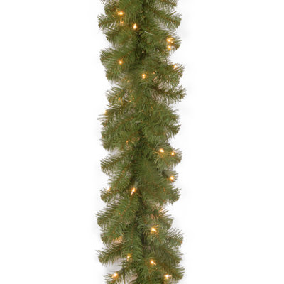 The Holiday Aisle® 9ft. North Valley Spruce Garland with Dual Color LED Lights