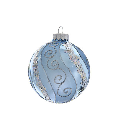 Ornement boule de verre à paillettes et paillettes