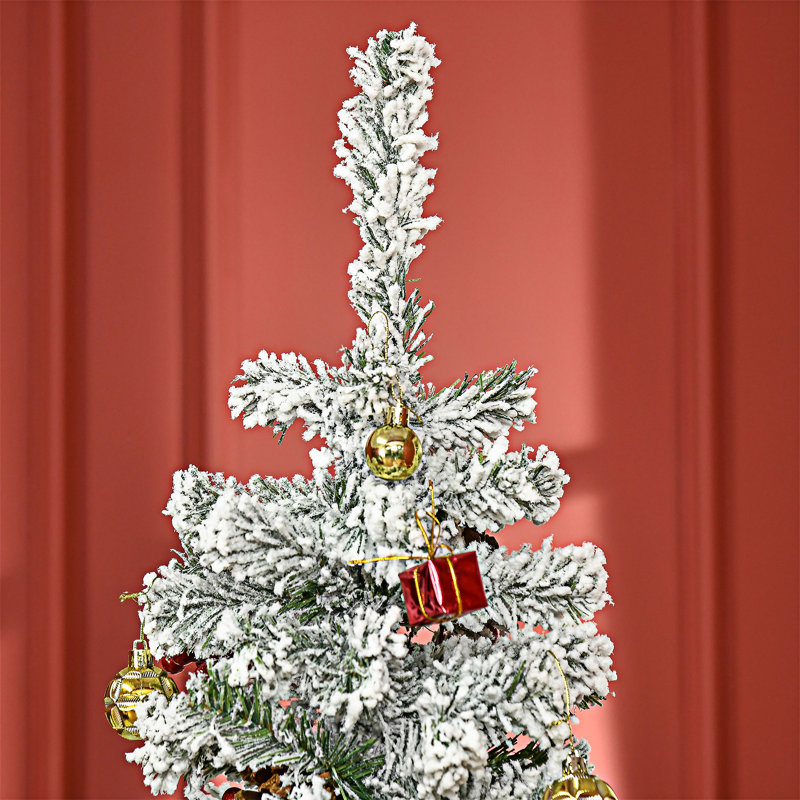Arbre de Noël artificiel enneigé