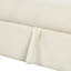 Canapé modulaire en L avec fonction escamotable, housses de couette mobiles en teinte beige et coussin épais