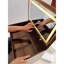 Bureau de meuble-lavabo pratique en noyer avec espace de rangement et tabouret confortable au design compact et moderne