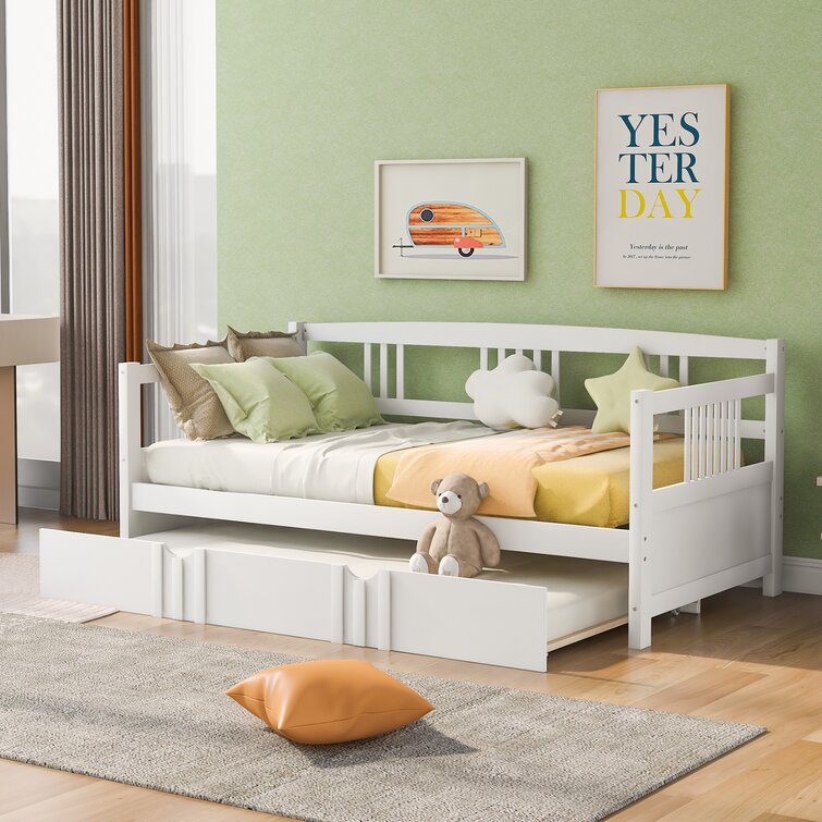 https://assets.wfcdn.com/im/39785611/resize-h755-w755%5Ecompr-r85/1399/139912687/Safak+Solid+Wood+Daybed+with+Trundle.jpg