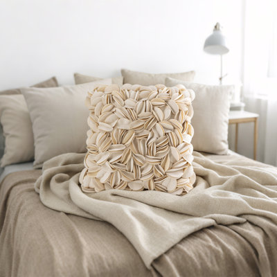 Housse de coussin brodée