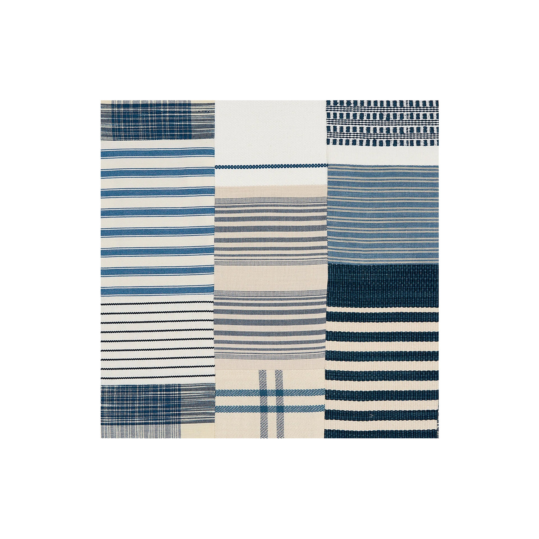 Square area rug featuring a patchwork design with blue and cream stripes, plaids, and textured woven patterns.