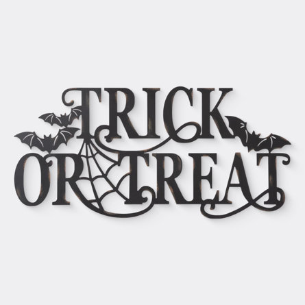 Trick or Treat metal sign with bats and spiderweb.
