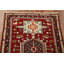 Tapis rouge à motif géométrique 3x8