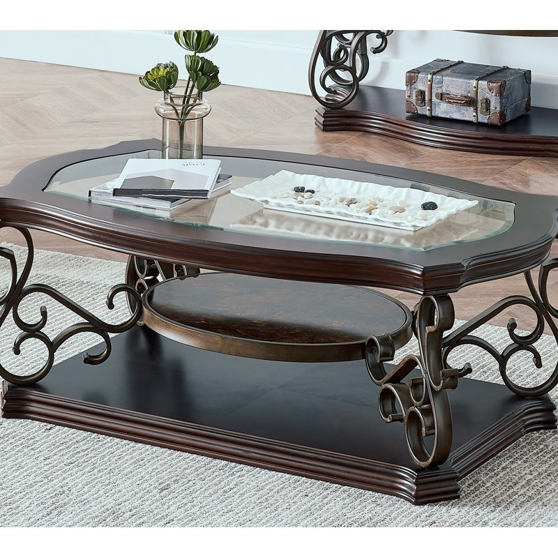 Table basse ovale avec plateau en verre et tablette
