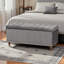 Banc de rangement avec repose-pieds capitonné en tissu gris H 18,58 po x l 41,56 po x P 16,52 po Mosa
