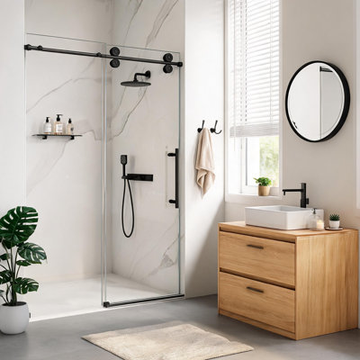 Porte de douche coulissante simple sans cadre, noir mat, de 112 à 122 cm, avec verre trempé transparent de 8 mm et système de douche à ouverture latérale.