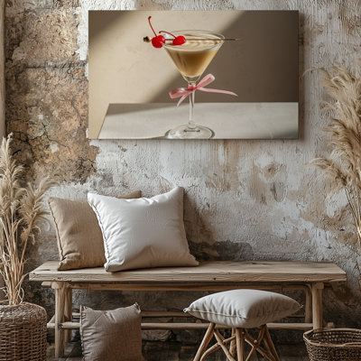 Toile, un élégant verre à martini élégant rempli d'un art mural crème clair, cocktail brun garni de deux cerises rouges vives sur toile