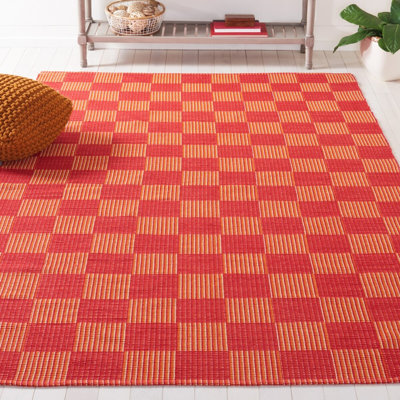 Tapis rouge / rouille Della