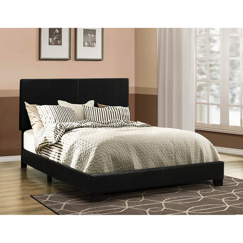 Structure de lit double en similicuir noir avec un panneau de chambre à coucher élégant et confortable, un attrait contemporain
