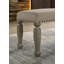 Banc rembourré à têtes de clou
