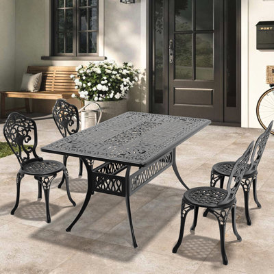 Repas en fonte d'aluminium 5 avec cadre noir. Artisanat traditionnel pour l'élégance. 100% aluminium Repose-pieds ergonomique. Coussin en nylon Pa66 Processus d'assemblage simple. Seats 4. Table rectangulaire