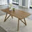 Dafne 70" Rectangular Walnut Oak Geometric Cross Base Dining Table