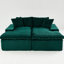 Chaise longue double recouverte de velours tortue, garnie de mousse comprimée, confortable pour 2 personnes dans un coin salon.